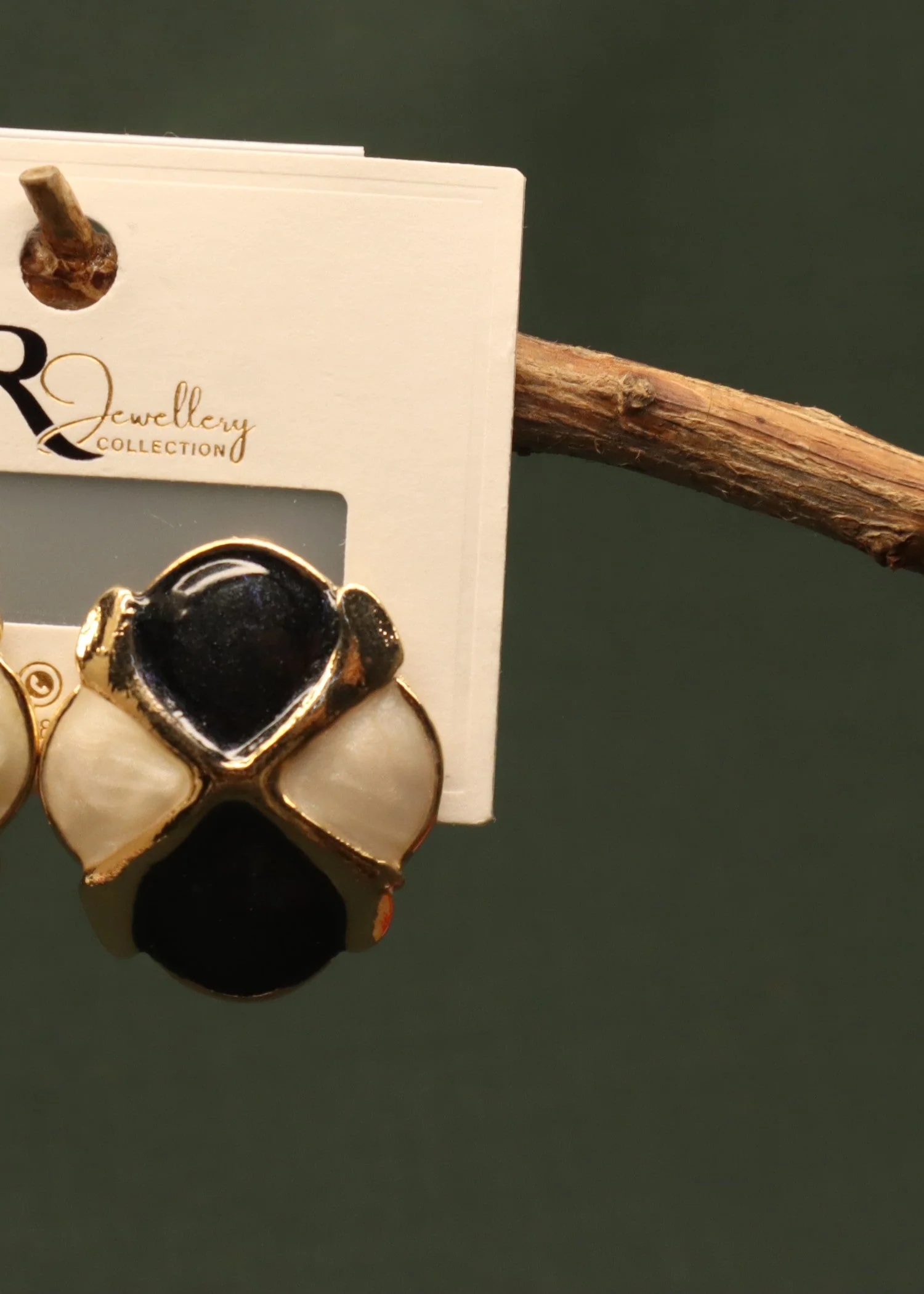 Mr.RJ |PA- black and cream croiss studs